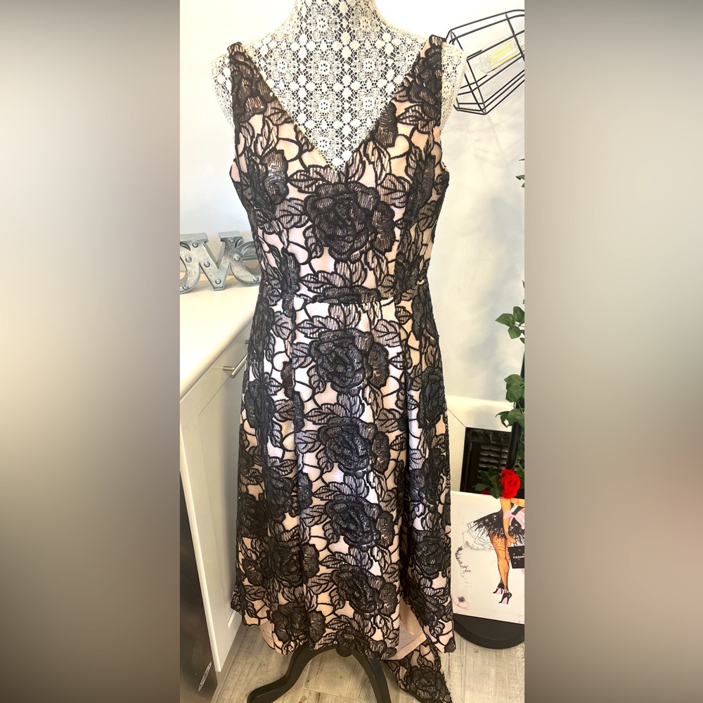 Calvin Klein high-low floral evening gown with embroidery and subtly sequined.